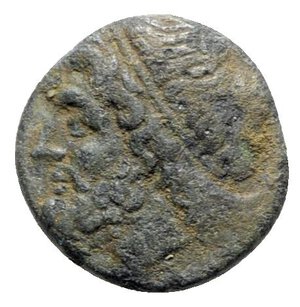 obverse: Sicily, Syracuse. Hieron II (275-215 BC). Æ (18mm, 4.43g, 9h). Diademed head of Poseidon l. R/ Ornamented trident head flanked by two dolphins. SNG ANS 964ff.; HGC 2, 1550. Near VF