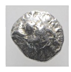 obverse: Aeolis, Kyme, c. 450-400 BC. AR Tetartemorion (3mm, 0.14g). Eagle’s head l. R/ Incuse square. Cf. SNG von Aulock 1623 (Hemiobol). Good VF
