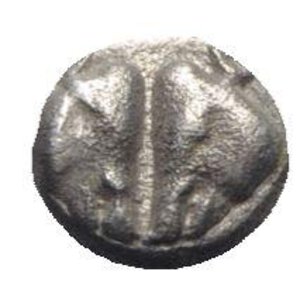 obverse: Lesbos, Unattributed early mint, c. 500-450 BC. BI 1/12 Stater (7mm, 0.67g). Confronted boars’ heads. R/ Four-part incuse square. HGC 6, 1067. VF