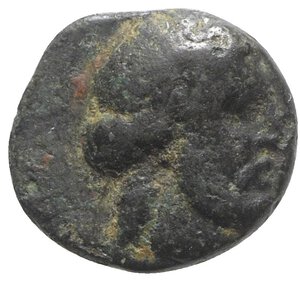 obverse: Caria, Nysiros, mid 4th-late 3rd century BC. Æ (11mm, 1.19g, 12h). Laureate head of Zeus. R/ Dolphin r., trident below. BMC 3. Good Fine