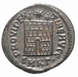 reverse: Constantine I (307/310-337). Æ Follis (19mm, 2.65g, 12h). Cyzicus, 325-6. Laureate head r. R/ Camp-gate surmounted by two turrets, star above; SMKΓ•. RIC VII 34. VF