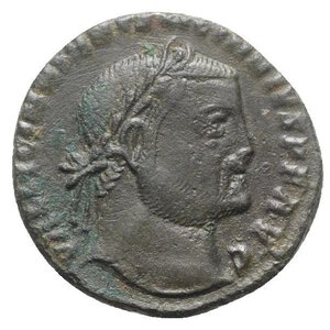 obverse: Licinius I (308-324). Æ Follis (23mm, 5.50g, 6h). Cyzicus, c. 309-10. Laureate head r. R/ Genius standing l., sacrificing from patera over altar and holding cornucopia; A-star//MKV. RIC VI 54. About VF