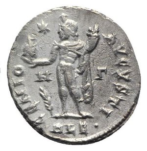 reverse: Maximinus II (310-313). Æ Follis (21mm, 4.98g, 11h). Alexandria, c. 312-3. Laureate head r. R/ Genius standing l., holding bust of Serapis and cornucopia; star/N/palm/Γ//ALE. RIC VI 160b. Roughness, near VF