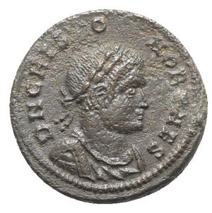 obverse: Crispus (Caesar, 316-326). Æ Follis (19mm, 3.32g, 6h). Lugdunum, AD 321. Laureate, draped and cuirassed bust r. R/ Standard inscribed VOT/XX between two seated captives; C-R/PLG. RIC VII 118. Rare, near VF