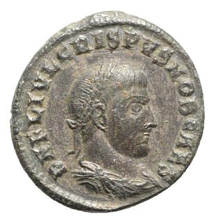 obverse: Crispus (Caesar, 316-326). Æ Follis (20mm, 3.32g, 6h). Nicomedia, 317-320. Laureate and draped bust r. R/ Jupiter standing l., holding Victory on globe and sceptre; palm– •/A//SMN. RIC VII 32. VF