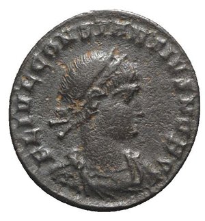 obverse: Constantius II (Caesar, 324-337). Æ (17mm, 2.20g, 12h). Nicomedia, 328-9. Laureate, draped and cuirassed bust r. R/ Two soldiers holding spears and shields with two standards between them; SMNΔ. RIC VII 191. VF
