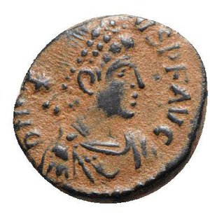obverse: Arcadius (383-408). Æ (14mm, 1.96g, 6h). Antioch, 406-8. Pearl-diademed, draped and cuirassed bust r.; star behind. R/ Arcadius, Honorius and Theodosius standing facing; ANTΔ. RIC X 151. Brown patina, VF