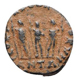 reverse: Arcadius (383-408). Æ (14mm, 1.96g, 6h). Antioch, 406-8. Pearl-diademed, draped and cuirassed bust r.; star behind. R/ Arcadius, Honorius and Theodosius standing facing; ANTΔ. RIC X 151. Brown patina, VF