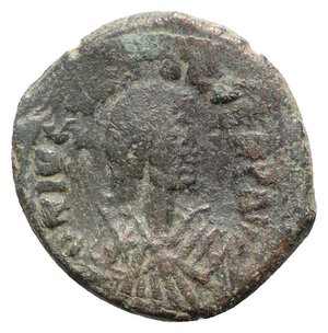 obverse: Justin I (518-527). Æ 20 Nummi (26mm, 8.32g, 6h). Constantinople. Diademed, draped and cuirassed bust r. R/ Large K; long cross to l., star above and below, B to r. Sear 69. Near VF