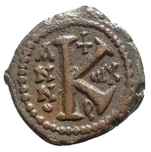 reverse: Maurice Tiberius (582-602). Æ 20 Nummi (23mm, 6.12g, 12h). Theoupolis (Antioch), year 13 (594/5). Crowned bust facing, wearing consular robes, holding mappa and eagle-tipped sceptre. R/ Large K; cross above, date across fields; symbol below. MIBE 99; DOC 188; Sear 535. VF