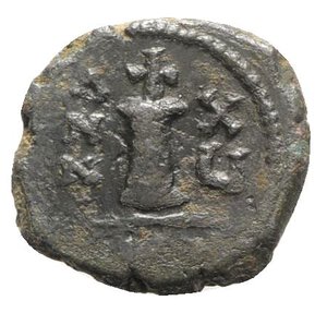 reverse: Maurice Tiberius (582-602). Æ 10 Nummi (18mm, 3.11g, 12h). Antioch, year 15 (596/7). Crowned facing bust, wearing consular robes and holding mappa and eagle sceptre. R/ Large I; cross above, date across fields, THEUP’. Sear 537. About VF