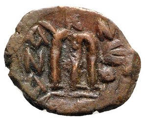 reverse: Constans II (641-668). Æ 40 Nummi (22mm, 3.65g, 6h). Constantinople. Constans standing facing, wearing crown and chlamys, and holding long cross and globus cruciger. R/ Large m. Sear 1000. About VF