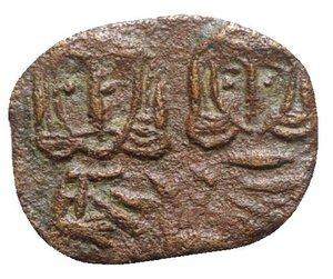 reverse: Constantine V (741-775). Æ 40 Nummi (19mm, 1.72g, 6h). Syracuse, 757-775. Crowned facing busts of Constantine and Leo IV, each wearing chlamys and holding akakia; cross between. R/ Crowned figure of Leo III standing facing, wearing chlamys and holding cross potent. DOC 19; Sear 1569. VF