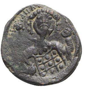 reverse: Michael VII Ducas (1071-1078). Æ 40 Nummi (25mm, 6.81g, 6h). Constantinople. Bust of Christ Pantokrator facing; star to l. and r. R/ Crowned bust of Michael facing, holding labarum and globus cruciger. DOC 14b; Sear 1878. Near VF