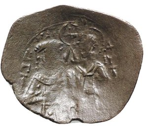 reverse: John Comnenus-Ducas (Emperor of Thessalonica, 1237-1242). BI Trachy (28.5mm, 3.91g, 6h). Thessalonica. Half-length facing bust of St. Theodore, holding spear and shield. R/ Half-length facing busts of John and St. Demetrius, holding between them staff surmounted by cross within ring. DOC 17; Sear 2202. VF