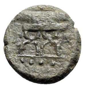 reverse: Northern Lucania, Paestum, late 1st century BC. Æ Triens (15mm, 3.74g, 2h). Curule chair; four pellets below. R/ Fasces. HNItaly 1247; Crawford 30. Near VF