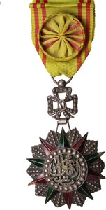 obverse: Tunisia.  Muhammad VIII al-Amin (1943-1957).. III class (?) badge with rosette