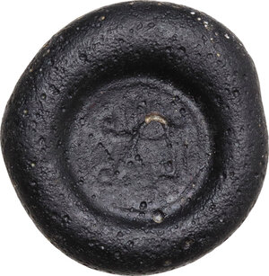 obverse: Anonymous Glass Weight of 1 Nomisma (circa 6th-7th century). Black opaque with Monogram