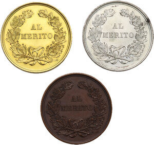 reverse: Municipio di Faenza. Lotto di tre (3) medaglie al merito fine XIX sec. in bronzo, bronzo dorato e bronzo argentato