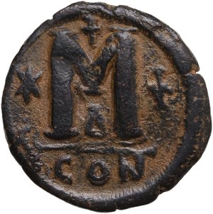 reverse: Justin I and Justinian I  (4 April-1 August 527). AE Follis. Constantinople mint, 4th officina