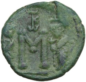 reverse: Constans II, with Constantine IV, Heraclius, and Tiberius (641-668). . AE Follis. Syracuse mint. Struck 659-663