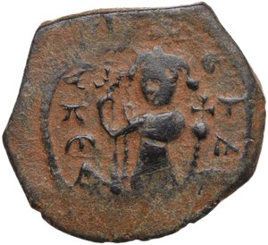 obverse: Umayyad Caliphate. Arab-Byzantine coinage (Pseudo-Byzantine type). . AE Fals, Emesa mint, c. 660-680