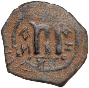 reverse: Umayyad Caliphate. Arab-Byzantine coinage (Pseudo-Byzantine type). . AE Fals, Emesa mint, c. 660-680