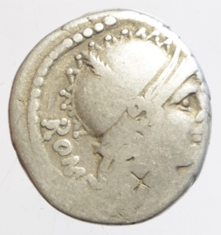obverse: Repubblica Romana .Gens Carisia. Titus Carisius. 46 a.C. Denario.D/ROMA Testa di Roma verso destra . R/ T CARISI (Titus Carisius ) scettro timone globo e cornucopia in corona d alloro. Cr.464/3a. Peso 3,81 gr. Diametro 19 mm. qBB.