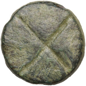 obverse: Bronze board game token decorated with a cross and concentric circles.  Roman period.  Diameter: 17 mm