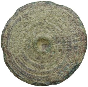 reverse: Bronze board game token decorated with a cross and concentric circles.  Roman period.  Diameter: 17 mm