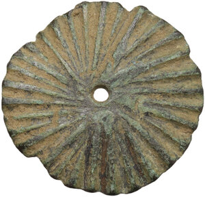 obverse: Bronze pendant or part of cutting tool.  Roman period.  Diameter: 26 mm