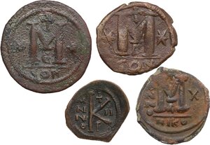 reverse: The Byzantine Empire.. Lot of 4 unclassified AE Denominations, including: Anastasius, Justin I, Justin II, Heraclius
