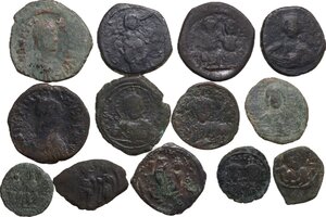 obverse: The Byzantine Empire. Lot of 13 unclassified AE denominations, including: Anastasius, Justin II with Sophia, Justinian I, Leo III with Constantine V, Phocas, Anonymous Folles