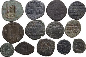 reverse: The Byzantine Empire. Lot of 13 unclassified AE denominations, including: Anastasius, Justin II with Sophia, Justinian I, Leo III with Constantine V, Phocas, Anonymous Folles