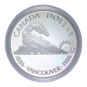 reverse: CANADA ELISABETTA II 1 DOLLARO 1986 VANCOUVER AG. 23,33 GR. PROOF IN COFANETTO