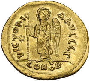 reverse: Justin I (518-527).. AV Solidus. Constantinople mint, 3rd officina. Struck 518-522