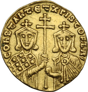reverse: Constantine VII Porphyrogenitus, with Romanus I and Christopher (921-931 AD).. AV Solidus. Constantinople mint. Struck 921 AD