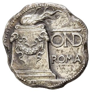 obverse: VENTENNIO FASCISTA - Distintivo OND Roma, Produttore Jokson, diametro 2.2. cm, metallo argentato.  I tipo in uso dal 1925 al 1927. SPL.