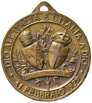 reverse: Medaglie papali. Pio XI. Medaglia 1929. AE (12,65 g - 31,7 mm) Opus Minocchi. Cusumano Modesti 195 (var. nella legenda del dritto). Colpetto al bordo.  SPL