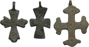 obverse: Lot of three bronze cross pendants in different designs, original loops partly broken.  Byzantine.  41, 35 and 32 mm