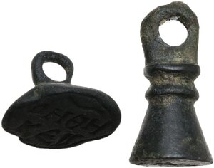obverse: Lot of two bronze seal stamps. One with seated figure, the other with inscription in two lines.  Byzantine.  21x10mm and 11x14 mm