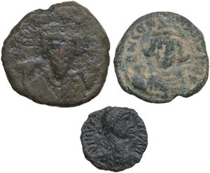 obverse: The Byzantine Empire.. Lot of 3 unclassified AE denominations, including: Phocas, Constantius II and Justinian I