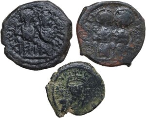 obverse: The Byzantine Empire.. Lot of 3 unclassified AE denominations, including: Jusitin II with Sophia and Maurice Tiberius