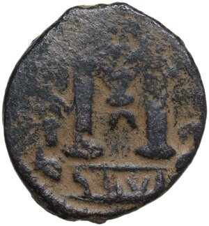 reverse: The Umayyad Caliphate.  Arab-byzantine, pre-reform coinage.. AE Fals, Baalbek mint, 41-77 H / 661-697 AD