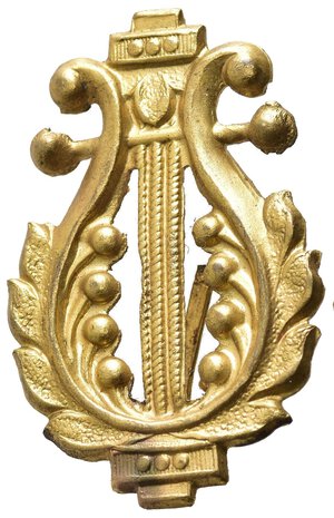 obverse: MEDAGLIE ESTERE – GERMANIA, distintivo per appartenente ad associazione musicale, raffigurante una lira, realizzato in bronzo dorato, con prongs posteriori coevi, dimensioni 32mm x 21mm ottime condizioni. 