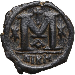 reverse: Justin I (518-527).. AE Follis. Nicomedia mint