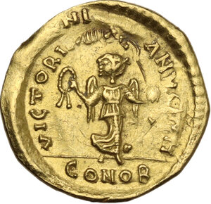 reverse: Justinian I (527-565).. AV Tremissis, Constantinople mint