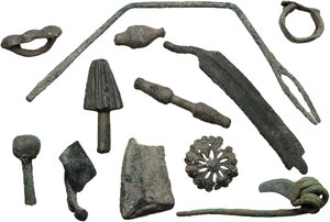 obverse: Miscellanea. Roman period to the Renaissance. Lot of twelve (12) bronze items, including parts of a fibula, military and civil objects