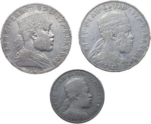 obverse: Ethiopia.  Menelik II (1889-1913). Lot of three (3) AR Ethiopian coins, including, 1 birr, 1 birr minted in Paris, 1/2 birr minted in Paris