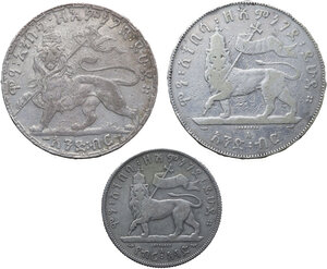 reverse: Ethiopia.  Menelik II (1889-1913). Lot of three (3) AR Ethiopian coins, including, 1 birr, 1 birr minted in Paris, 1/2 birr minted in Paris